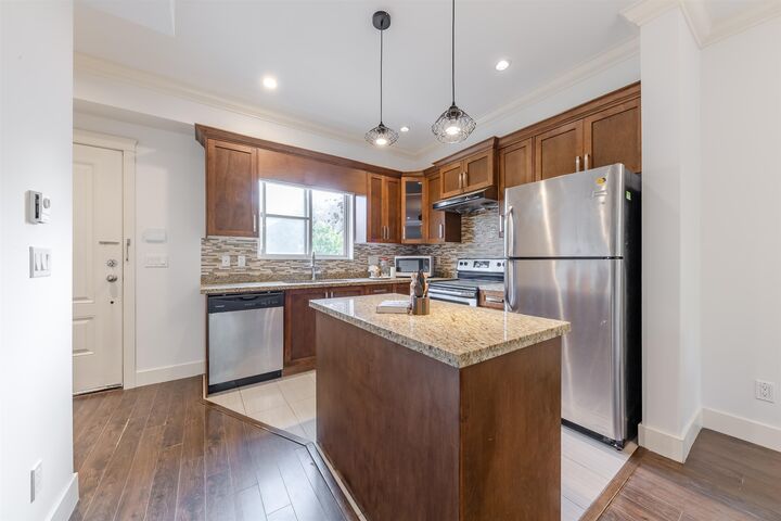 Property Photo: 7159 Stride Avenue 203 BC V3N 1T8