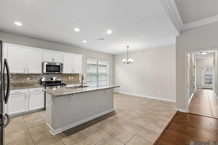 Property Photo:  16255 White Rose Dr  LA 70817 