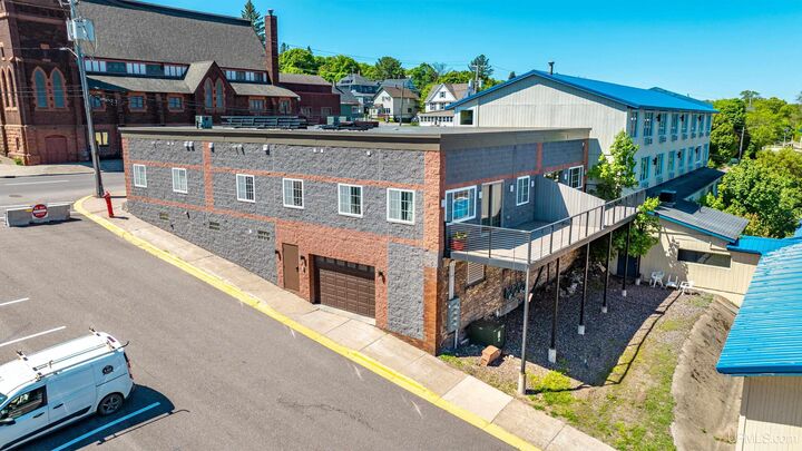 Property Photo:  208 E Montezuma Avenue  MI 49931 