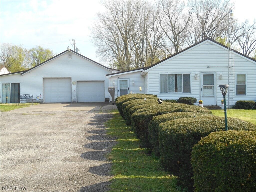 Property Photo:  5845 Woodman Avenue  OH 44004 