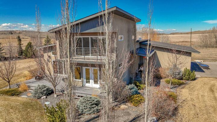 Property Photo:  306013 43 Street W  AB T1S 7A6 