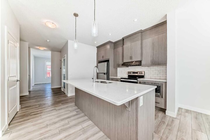 Property Photo: 121 Ambleside Heath NW AB T3P 1S4