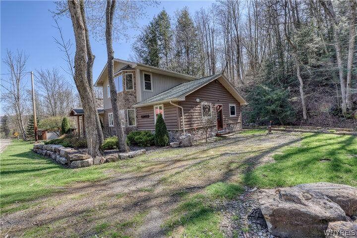 Property Photo:  6766 Hencoop Hollow Road  NY 14731 