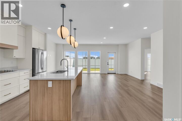 Property Photo:  10 720 Brighton Boulevard  SK S7V 1X1 