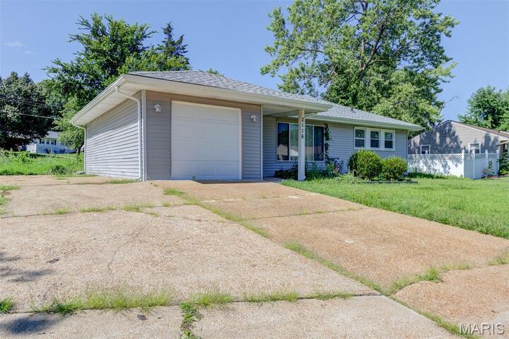 Property Photo:  2116 Jannette Drive  MO 63136 