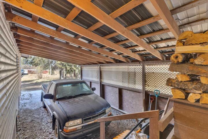 Property Photo:  354047 Highway 22  AB T0M 0M0 