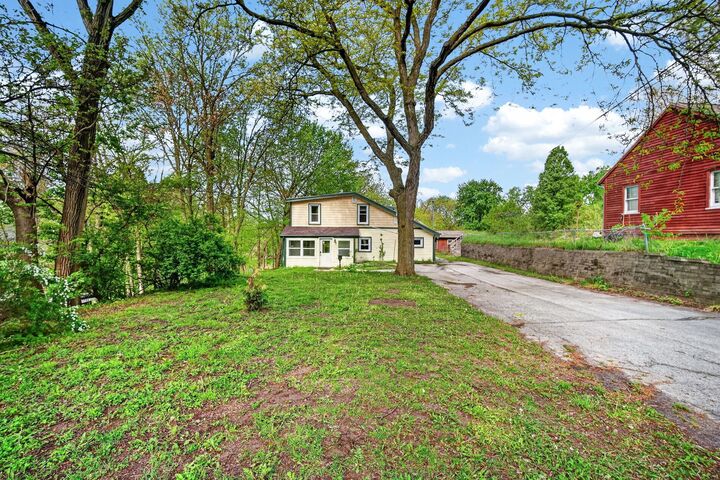 Property Photo:  1328 Merle Hay Road  IA 50311 