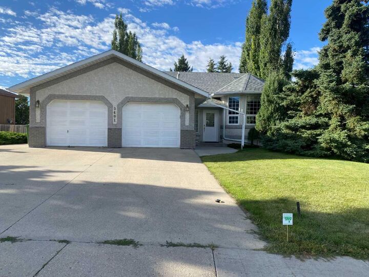 Property Photo: 5401 Shannon Drive AB T4H 1C2