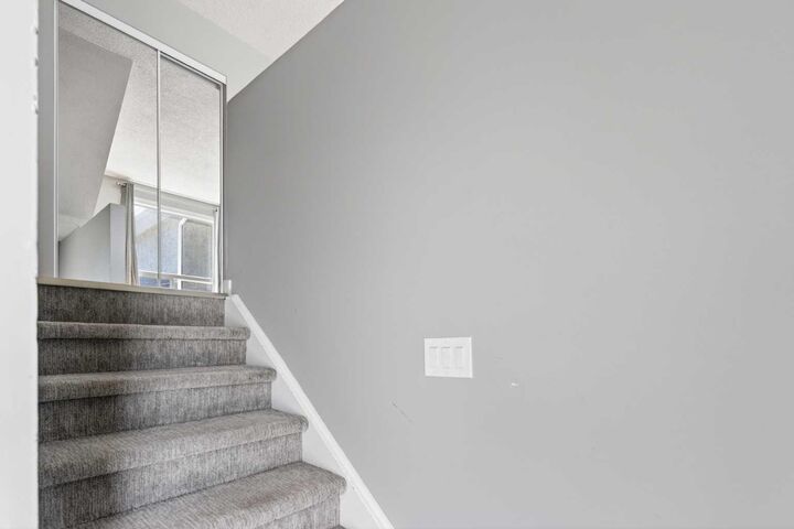 Property Photo: 6915 Ranchview Drive NW 141 AB T3G 1R8