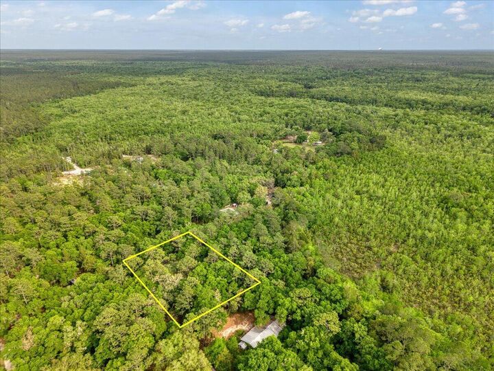 Property Photo:  0.17 Ac Tango Ln  FL 32563 