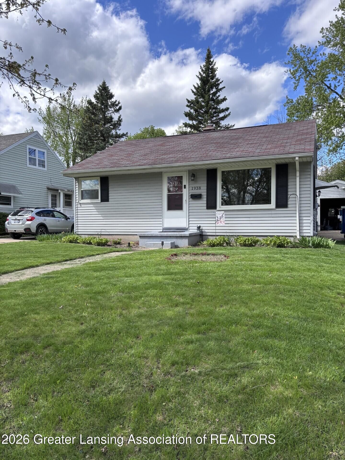 Property Photo:  1938 Cooper Avenue  MI 48910 