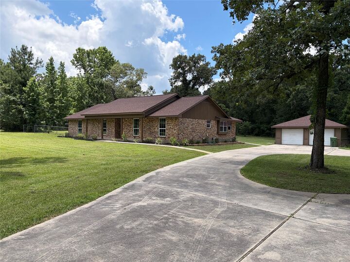 Property Photo: 14437 Jack Gibbs Road TX 77378