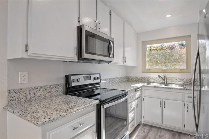 Property Photo:  1977 Ursina Place  CA 92024 