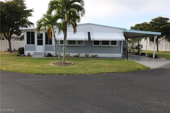 Property Photo:  116 Coachlight Drive  FL 33908 