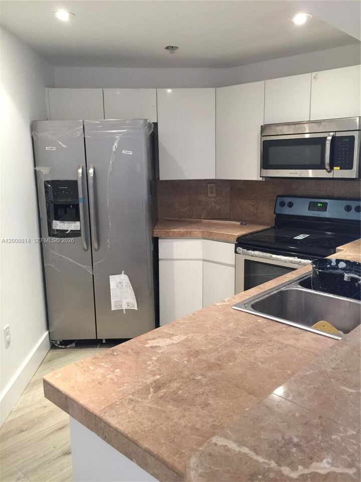 Property Photo:  9711 Fontainebleau Blvd D101  FL 33172 