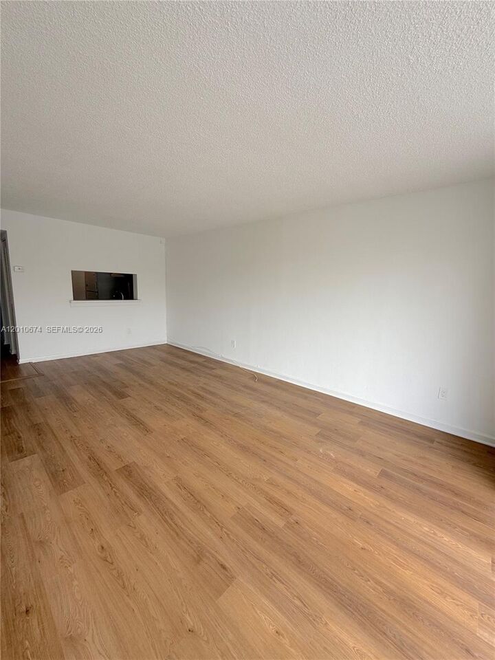 Property Photo:  482 NW 165th St Rd A-307  FL 33169 