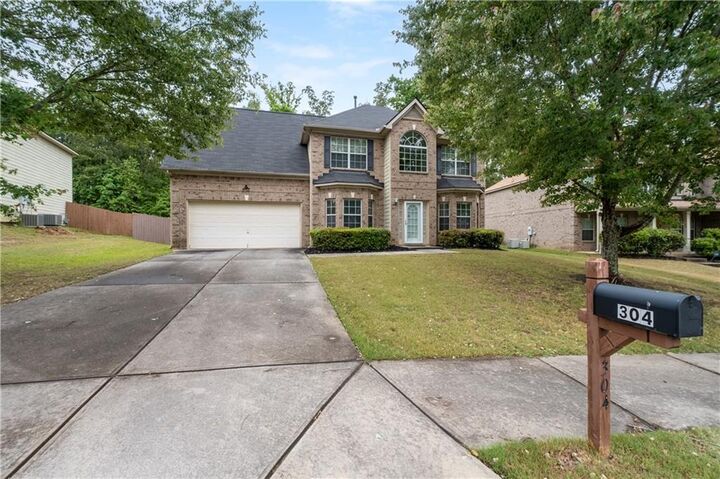 Property Photo:  304 Allegrini Drive  GA 30349 