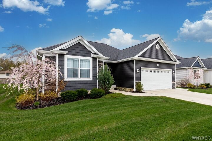Property Photo:  92 Country Club Court  NY 14072 