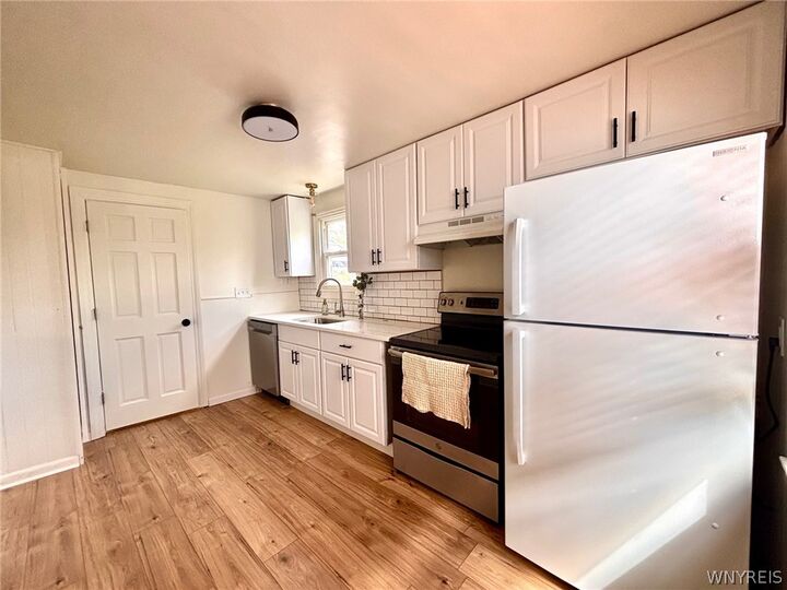 Property Photo:  142 Ellen Drive  NY 14225 