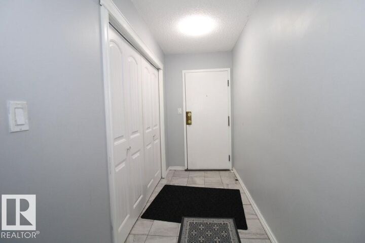 Property Photo: 1620 48 St NW 104 AB T6L 5P1