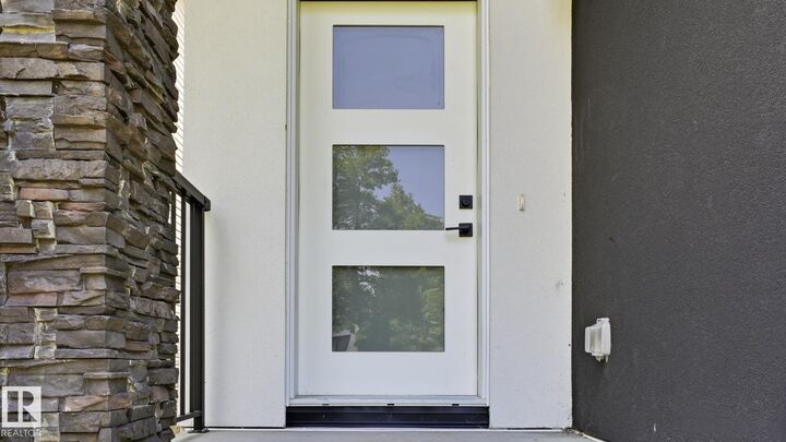 Property Photo: 11036 128 Street NW AB T5M 0W6
