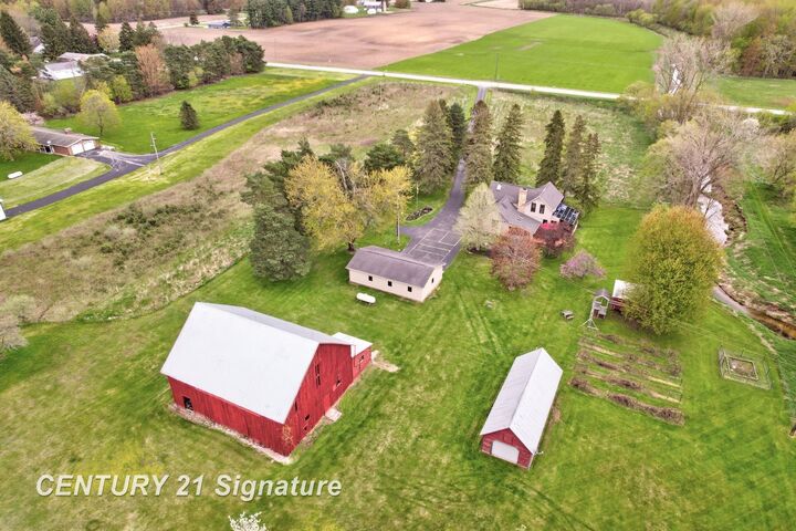 Property Photo:  4815 N Hemlock Road  MI 48626 