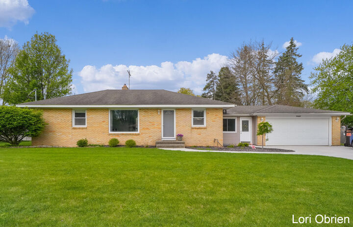 Property Photo:  7487 Lupine Avenue  MI 49428 