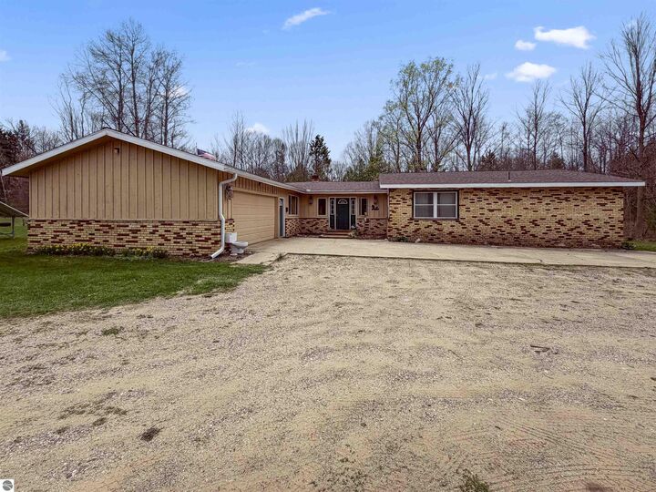 Property Photo:  4411 N 11 Road  MI 49688 