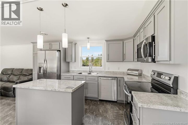 Property Photo:  184 Riverside Drive  NB E5L 1V9 