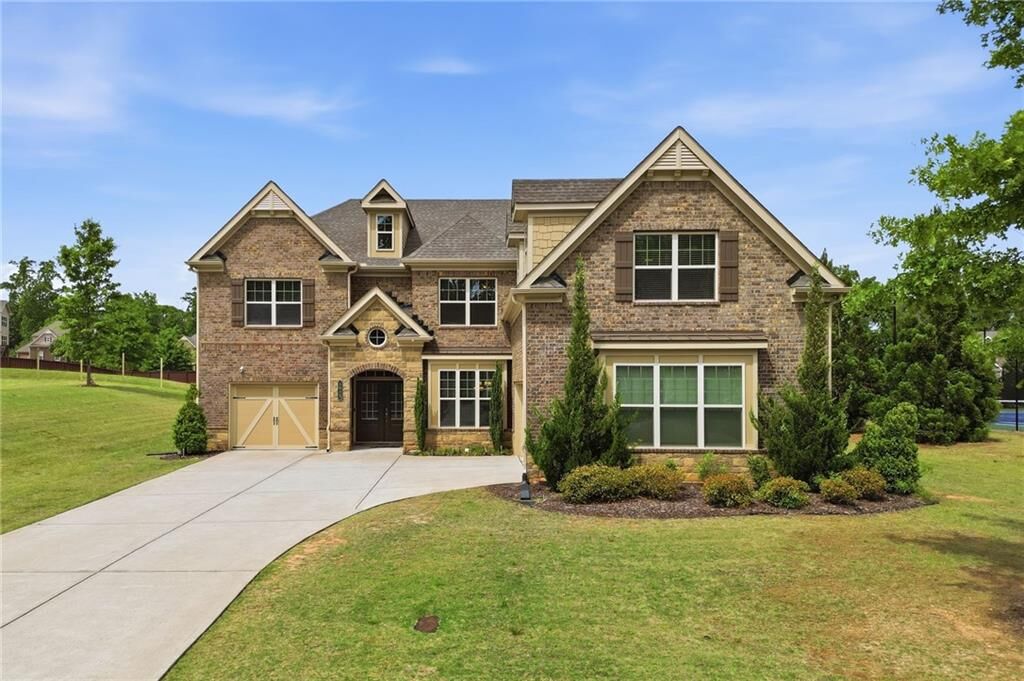 Property Photo:  5625 Turnbridge Pass  GA 30040 