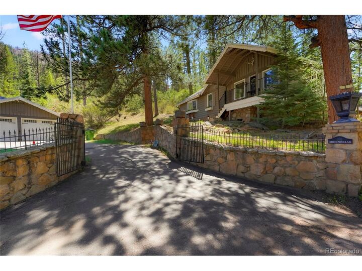 Property Photo: 32114 Upper Bear Creek Rd CO 80439