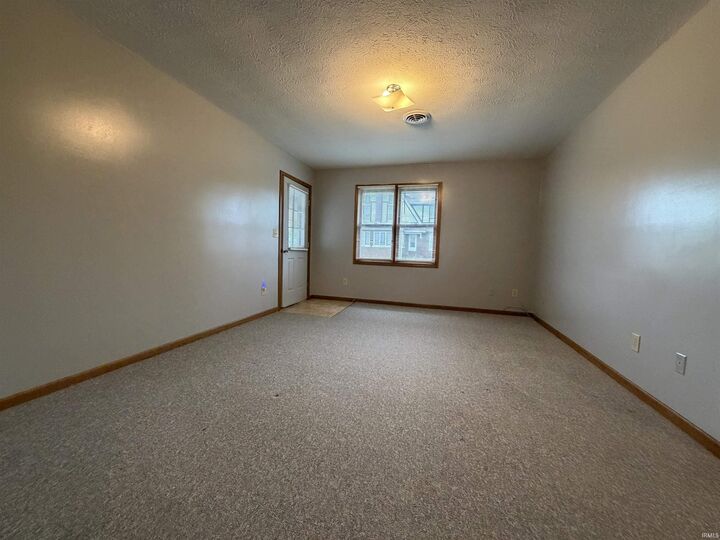 Property Photo:  301, 303, 305 SE A Street  IN 47441 