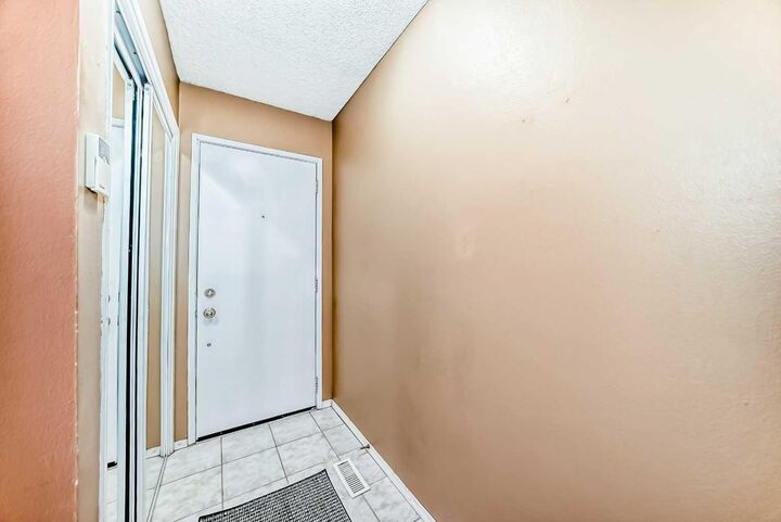 Property Photo:  123 Queensland Drive SE 98  AB T2J 5J4 