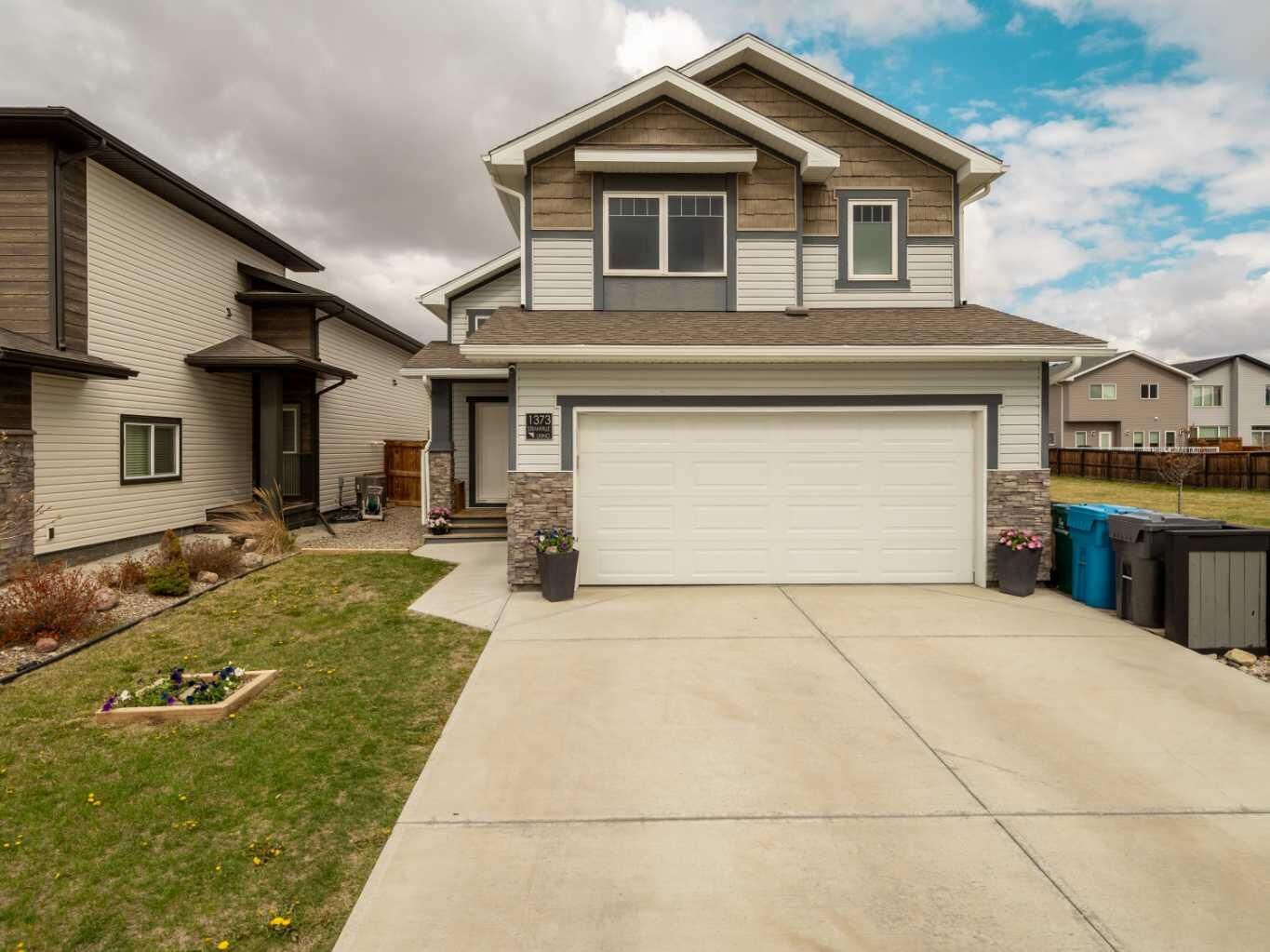Property Photo:  1373 Pacific Circle W  AB T1J 5V3 