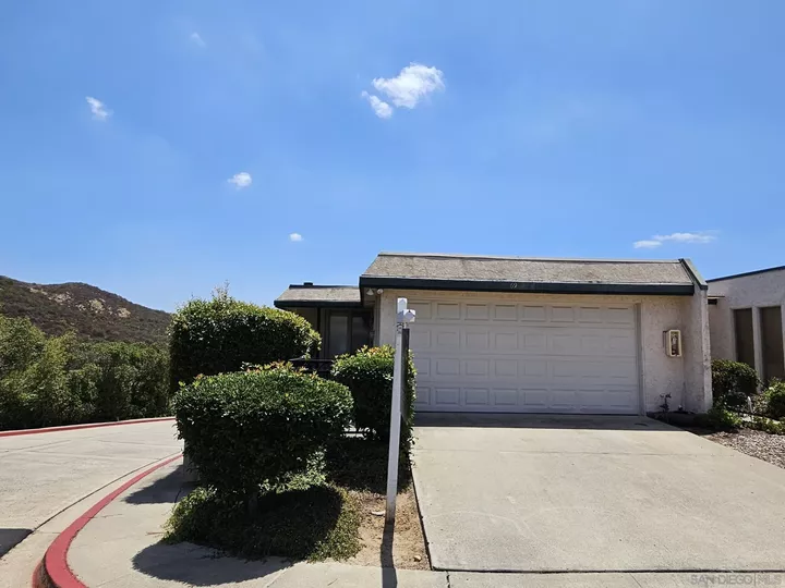 Property Photo:  6993 Caminito Curva  CA 92119 