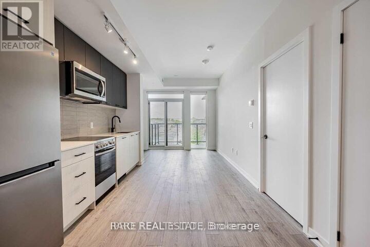 Property Photo:  2300 St Clair Avenue West 415  ON M6N 0B3 