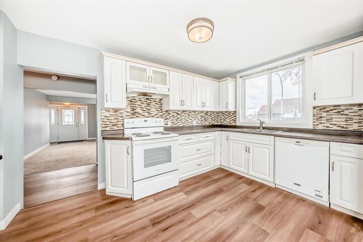 Property Photo:  348 Henderson Highway  MB R2L 1M8 