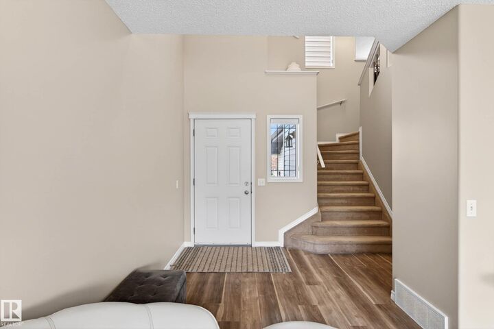 Property Photo:  7723 7A Avenue SW  AB T6X 0A2 
