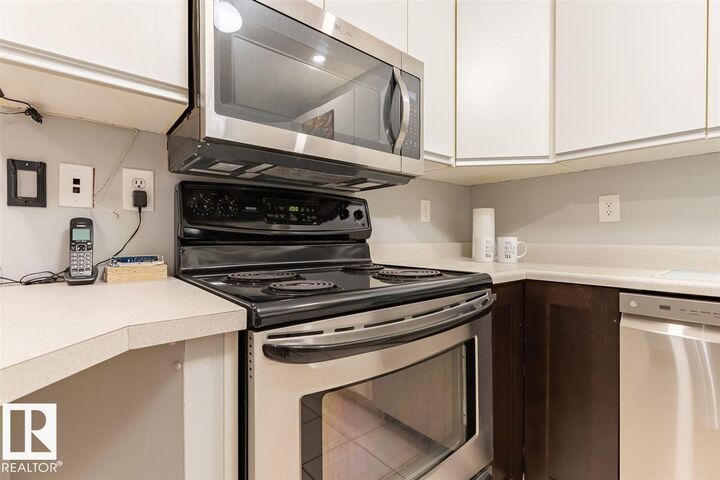 Property Photo:  9010 106 Avenue NW 108  AB T5H 2K3 