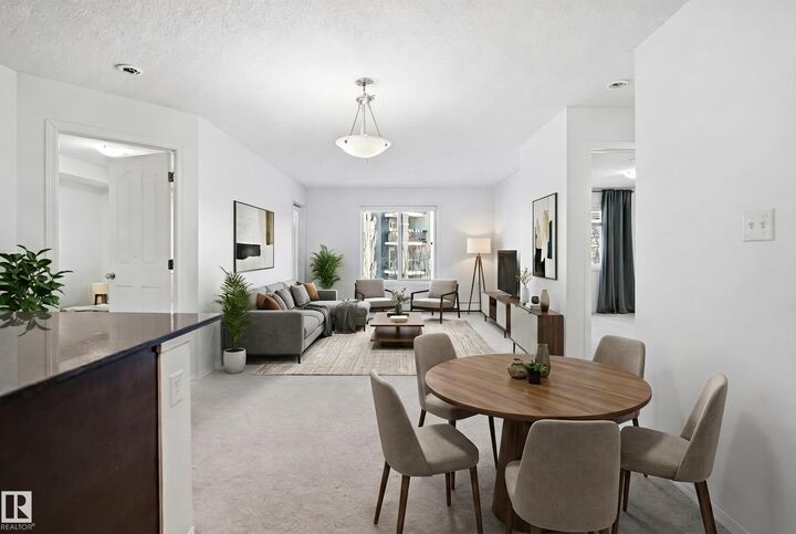 Property Photo: 11812 22 Ave SW 205 AB T6W 2A2