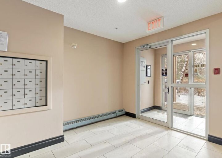 Property Photo:  12110 119 Ave NW 103  AB T5L 5G9 