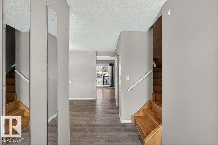 Property Photo:  9909 171 Avenue NW  AB T5X 4X2 