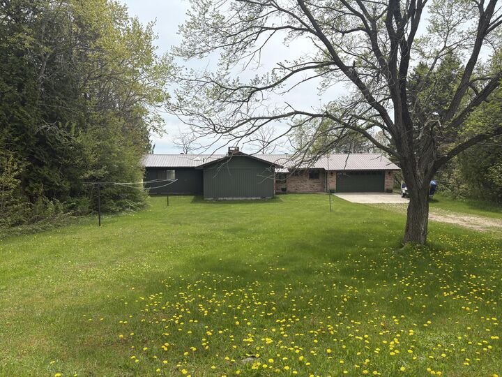 Property Photo: W11991 Middle Beach Rd MI 49762
