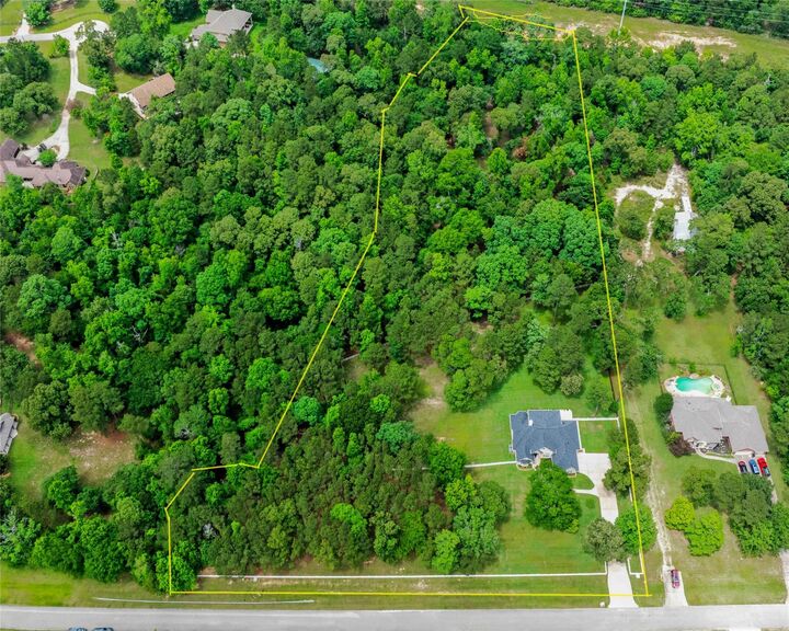 Property Photo:  345 Ridgelake Scenic Drive  TX 77316 