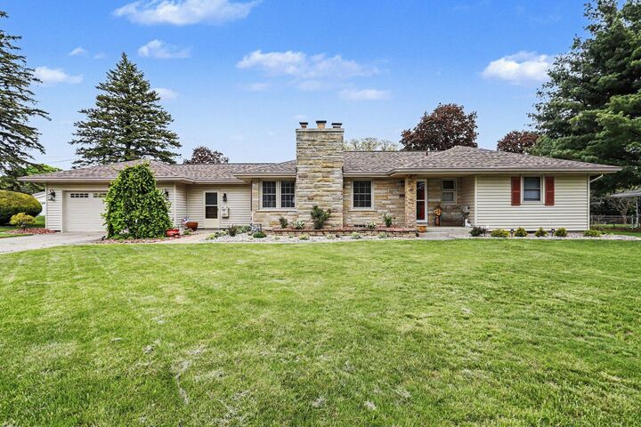 Property Photo:  210 Maplecrest Avenue  MI 49091 