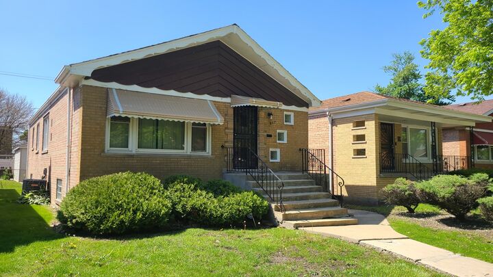 Property Photo:  317 E 107th Street  IL 60628 