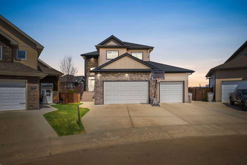 Property Photo: 1703 56 Avenue AB T9V 3L5