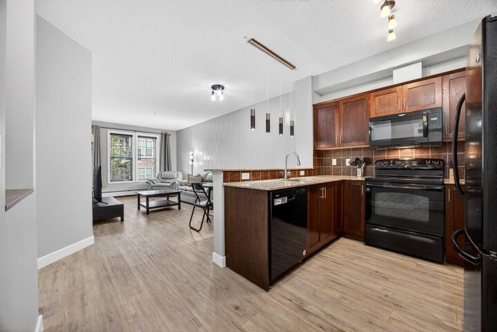 Property Photo:  201 Sunset Drive 206  AB T4C 0H5 