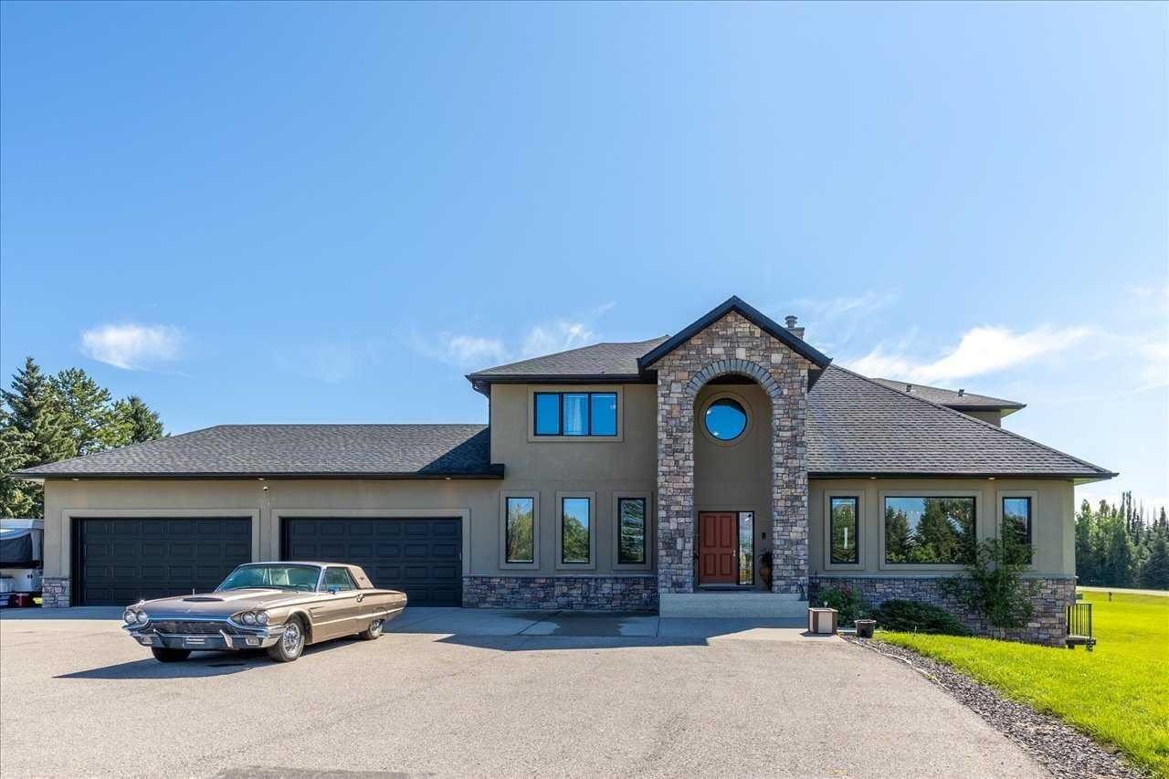 Property Photo:  244094 Partridge Place  AB T3Z 3M2 