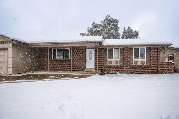 Property Photo:  1514 S Lee Street  CO 80232 